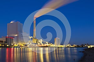 Large coal power plant at the river rhine in Mannheim - Germany