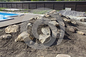 Large cobblestones on the Alpine hill, in the making