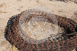 Large coil of barbed wire