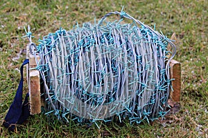 Large coil of barbed wire
