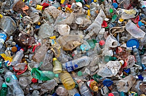 Large Collection of Plastic Bottles and Trash in a Pile