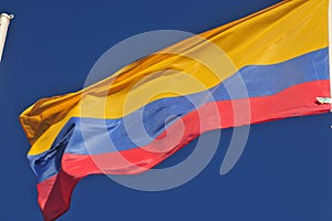 Large Colombia flag waving in the wind photo