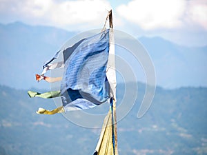 Large colorful prayer flags at Sikkims ancient capitol Rabdentse (India) in the Himalayan mountains