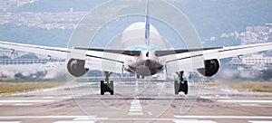 Large commercial airplane landing or take off on runway. Journey abroad tourism, oversea travel, flight transit