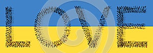 Large community of people forming LOVE word on Ukrainian flag. 3d illustration metaphor for  compassion