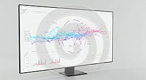 A large computer monitor displays a data visualization with interconnected nodes and
