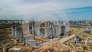 Large construction site. Construction of modern multi-storey residential buildings. Construction of apartment buildings from