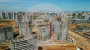 Large construction site. Construction of modern multi-storey residential buildings. Construction of apartment buildings from