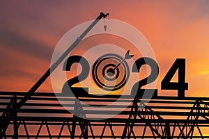 Large construction site, many construction cranes set vector numbers 2024. Construction team sets numbers for New Year 2024. Black