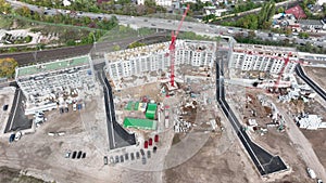 Large construction site of a residential building. Aerial view