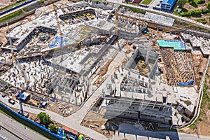 large construction site with working construction cranes. top view
