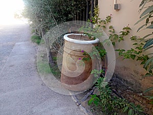 A large  container jar made from clay used in the past to preserve dates in the Oasis of Figuig