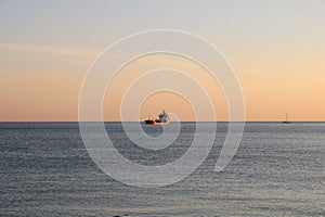 Large container ship in the open sea.