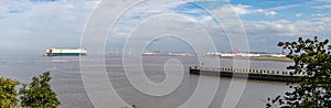 Large container ship passing Portishead into Portbury Docks, Bristol photo