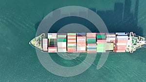 Large container ship at sea -Top down view. Aerial top view of cargo container ship vessel import export container sailing.