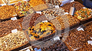 Large Counter of Dried Fruits and Nuts at a Farmers Market in La Boqueria. Barcelona. Spain