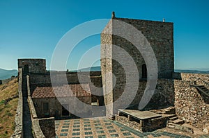 Large courtyard encircled by stone wall at the Marvao Castle