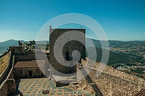 Large courtyard encircled by stone wall at the Marvao Castle