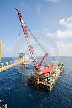 Large crane vessel installing the platform in offshore,crane barge doing marine heavy lift installation works