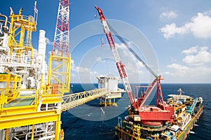 Large crane vessel installing the platform in offshore,crane barge doing marine heavy lift installation works in the gulf