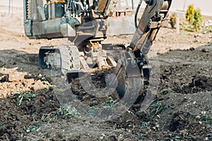 Large crawler excavator bucket. Excavator mechanical part for digging. Machines and mechanisms for construction