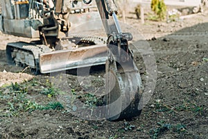 Large crawler excavator bucket. Excavator mechanical part for digging. Machines and mechanisms for construction
