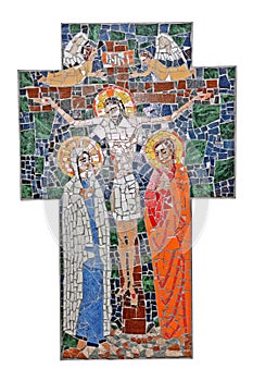 Large cross with colored mosaic depicting the crucified Christ and saints