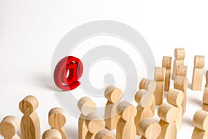 A large crowd of people looking at an email icon on a white background. The concept of e-mail and the Internet, communication