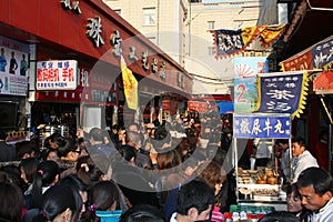 A large crowd at a snack market street on a public holiday in China