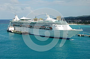 Large cruise ship being refueled photo