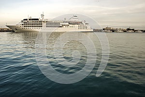 Large cruise ship in the port of Yalta, Crimea, Ukraine. June 2011