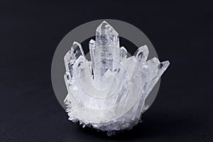 Large crystals of natural transparent stone rock crystal close-up, transparent quartz in crystals, rock, geology, magical rites