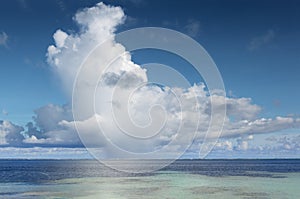 Large cumulonimbus over tropical ocean photo