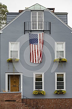 A large custom built house in a residential neighborhood in Plymouth MA