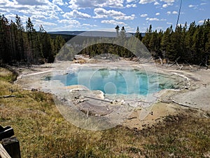 Large deep blue pool at Yellowstone National Park