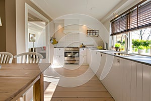 A large dining table made of live edge wood in the center, surrounded by chairs and bookshelves with children's