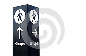 Large directional sign post with arrow and person icon pointing to shops. Isolated white background.