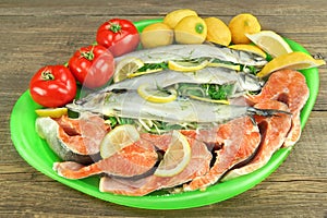 Large Dish With Fresh Stuffed Fish And Salmon Steak