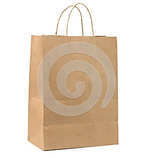 Large disposable brown kraft paper bag with handles isolated on white background, eco packaging