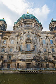 Large domed waterfront building with windows