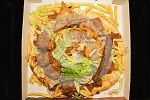 Large Donner Kebab on Naan Bread with Chips photo