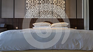 The large double bed is ready for bedtime.