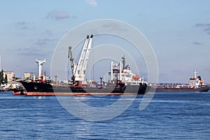 Large dry cargo ship on the roadstead of the Dnieper river