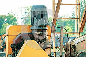 Large electric motor. Mounted on a metal structure. Industry