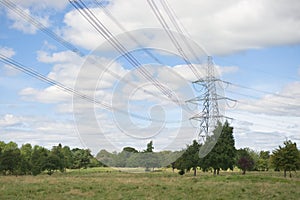 Large electricity pylon and overhead power lines in a rural setting
