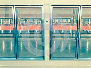 Large empty commercial fridges with temperature control at wholesale big-box store