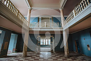 Large entrance hall with columns in old abandoned building, Sanatorium Gelati, Tskaltubo