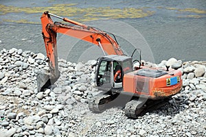 A large excavator is on the construction site..