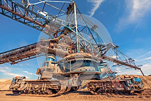 Large excavator machine in the mine