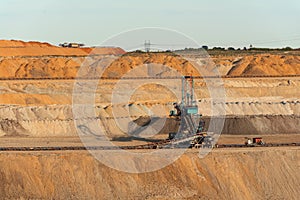 Large excavator machine in the mine